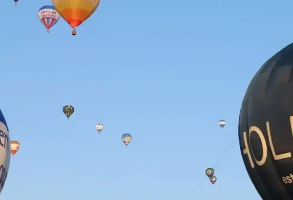 Multiple hot air balloons taking off