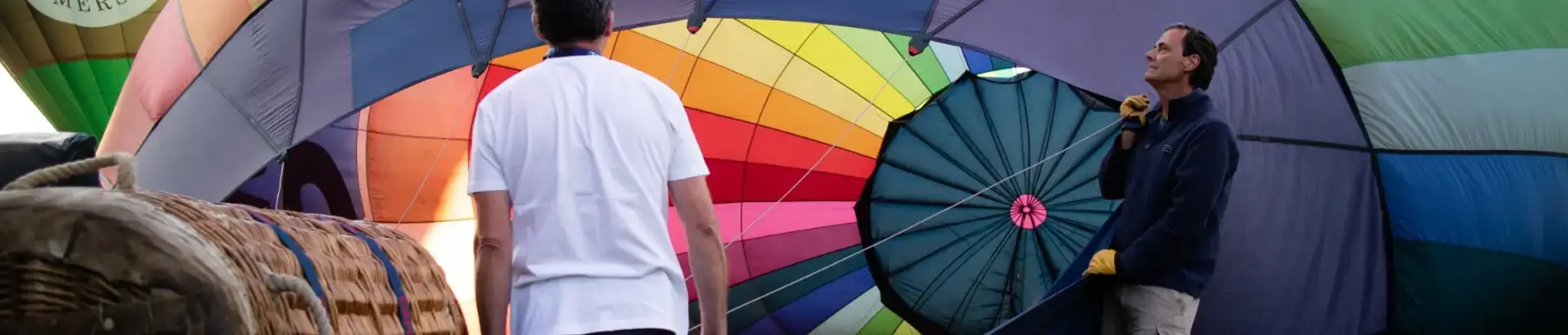 Two pilots inflating a hot air balloon